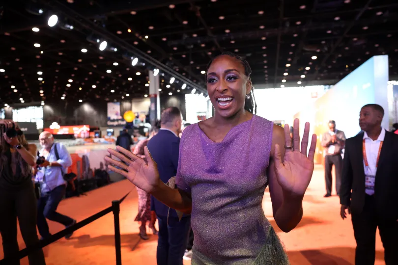 WNBA All-Star Nneka Ogwumike says hello to fans before walking the orange carpet on July 23, 2026, at McCormick Place ahead of the league’s All-Star Game on Saturday at the United Center.